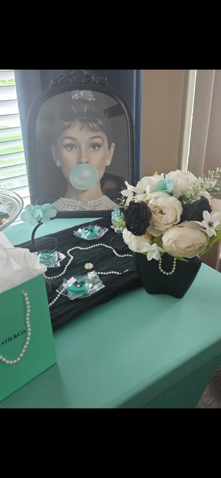 Audrey Hepburn portrait and Tiffany inspired floral display