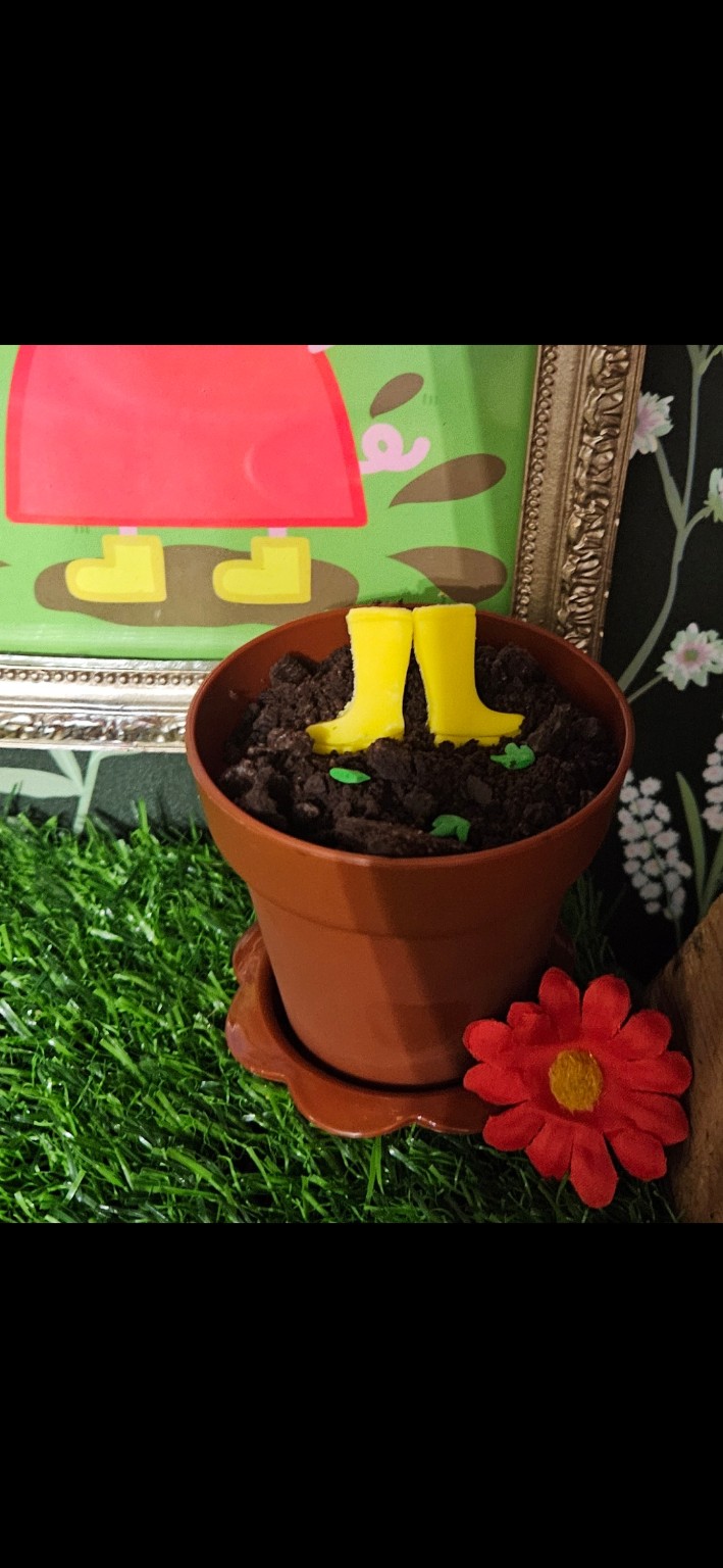 Muddy puddle dessert with yellow boots